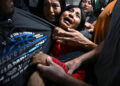Title: ICE Arrests at New York CourtCredit: © Carol Guzy, ZUMA Press, iWitness, for Miami HeraldCaption: ​​Distraught girls cling to their father, Luis, as ICE detains him following an immigration hearing. Luis served as the sole breadwinner for his family. New York City, New York, United States, 26 August 2025.Story: In 2025, shifts in US immigration policy transformed courthouses into focal points for mass deportation efforts by US Immigration and Customs Enforcement (ICE). Masked ICE agents detained undocumented migrants immediately following their hearings, often leading to deeply traumatic family separations. These aggressive tactics, coupled with severely overcrowded and unsanitary conditions at the 10th-floor holding facility in the Jacob K. Javits Federal Building in New York, prompted fierce public protests, class-action lawsuits, and the arrest of local elected officials demanding accountability.
